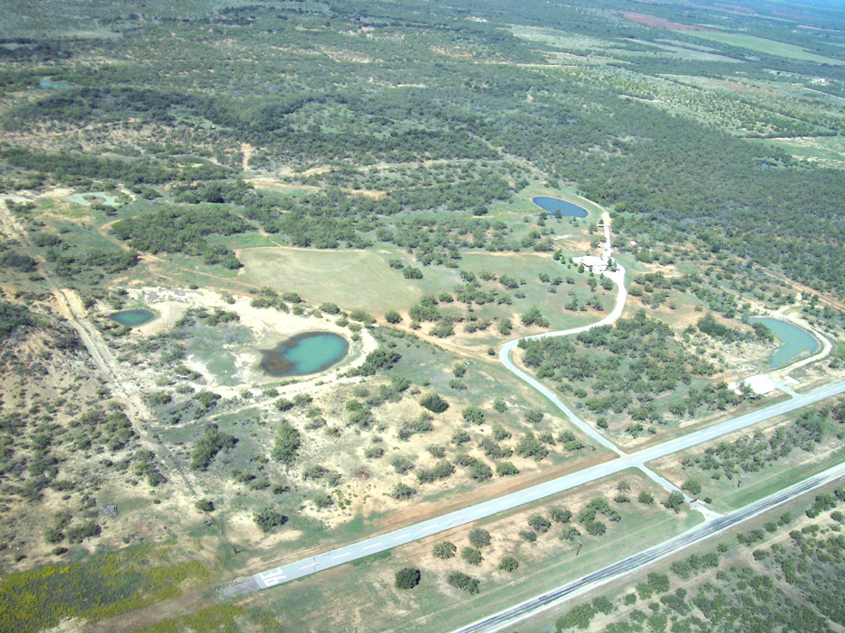 Ranch with paved runway for sale, includes home and hangar for sale